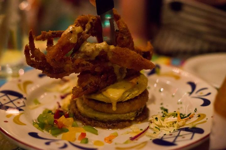 Softshell crab with fried eggplant, fried green tomatoes and crab hollandaise 